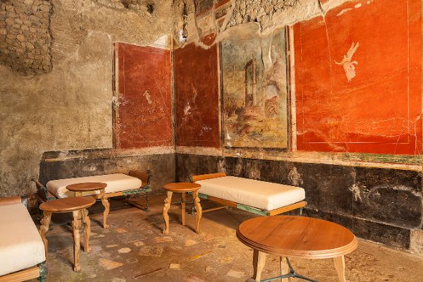 Decorated Roman interior with red walls at Pompeii