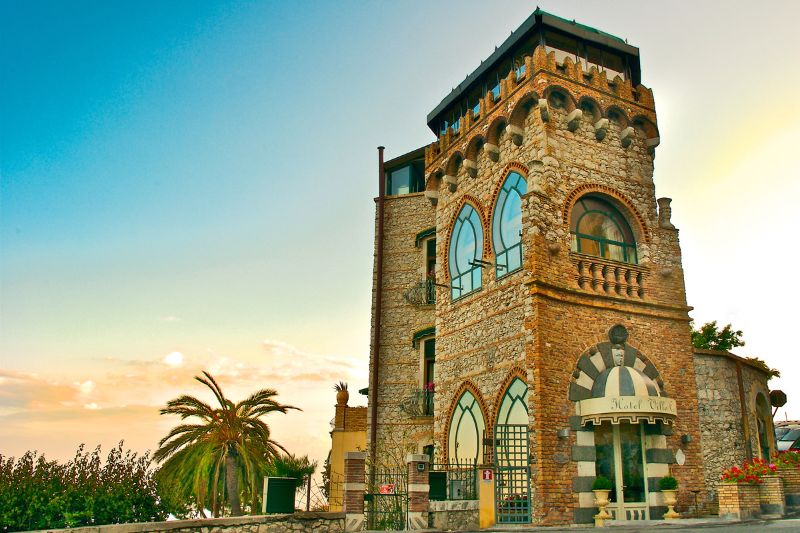 Hotel Villa Carlotta in Taormina with views across the coast