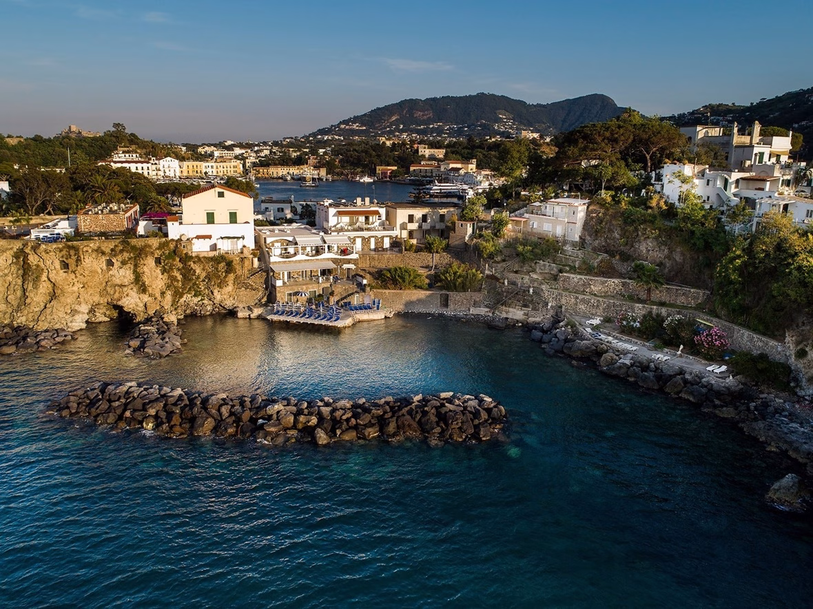 Aerial view showing Ischia Blu Resort beside the sea and harbour of Ischia Porto