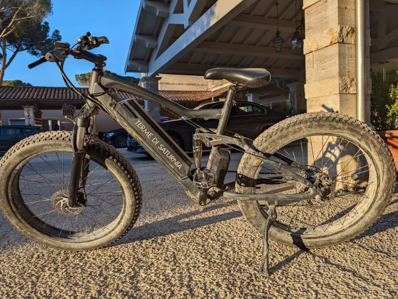 Terme di Saturnia branded fat-tyre e-bike parked outside the resort ready for an excursion
