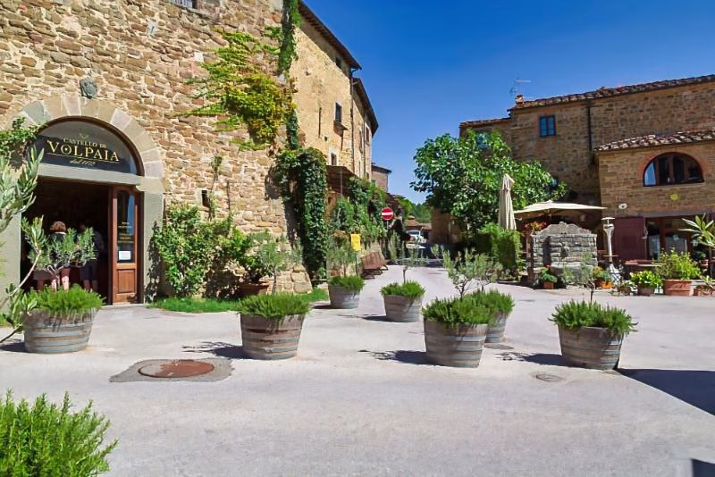 Stone buildings and tasting rooms in the medieval hamlet of Volpaia in Chianti