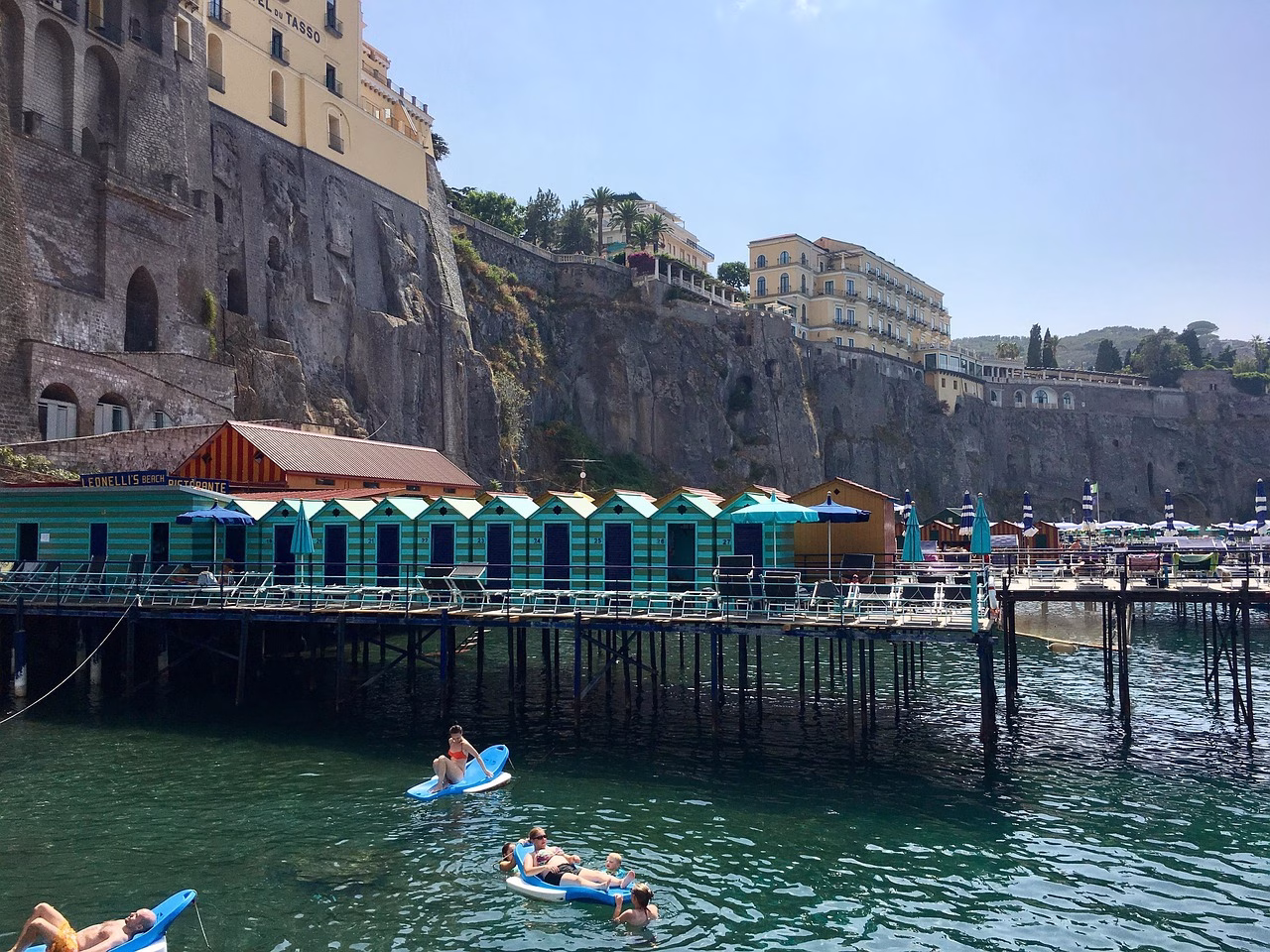 Bathing cabins and platforms below the cliffs beside Sorrento’s waterfront