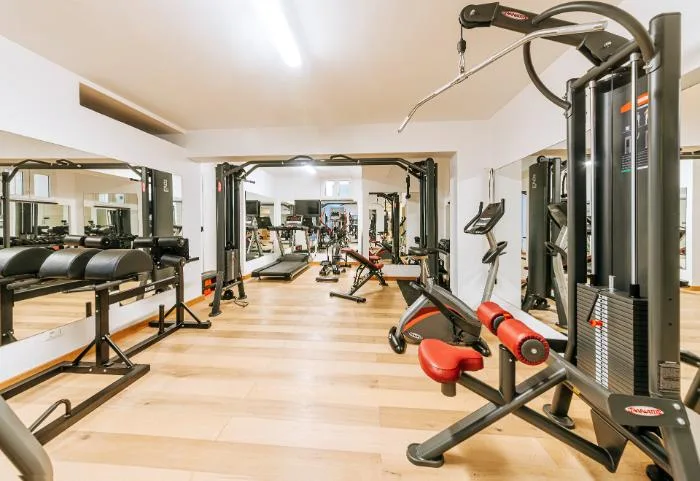 Fitness room with exercise equipment at La Madonnina Hotel in Ischia