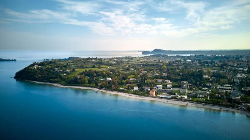 Aerial view of the Portese shoreline and San Felice del Benaco peninsula on Lake Garda