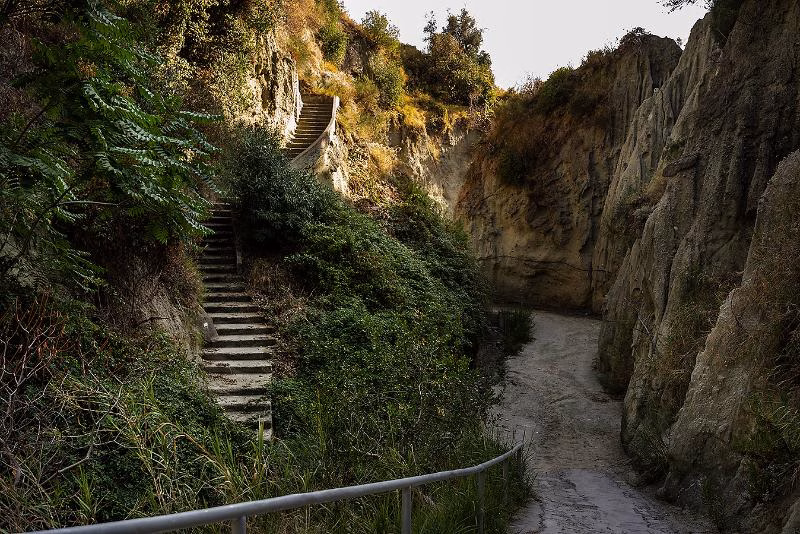 Stairway and tuff walls on the approach to Cavascura Terme, Ischia.