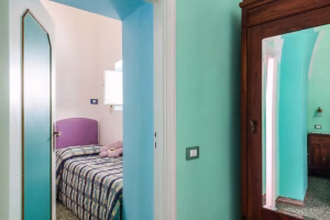 Corridor leading to twin bedroom at Il Brigante apartment Casale Villarena