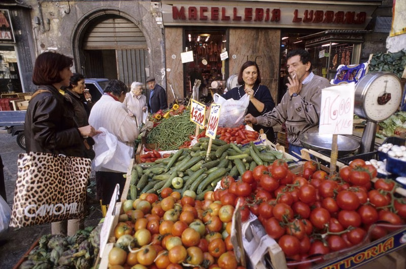 Tomatoes in Naples Market Naples street market with tomatoes, symbol of New World contaminations.