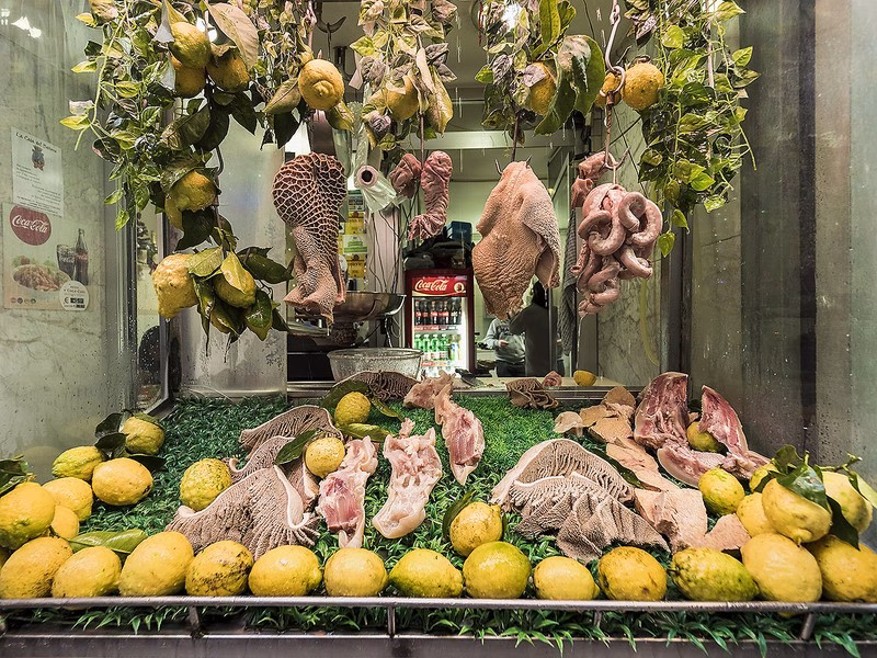 Tripe and Lemons at a Naples Market Display of fresh tripe and lemons in a Naples market stall.