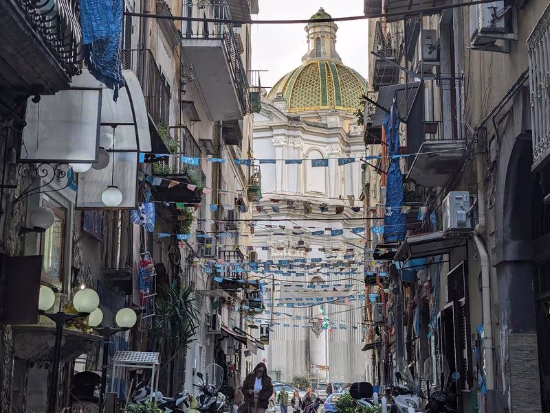 Basilica of Santa Maria della Sanità dome seen from the street in Naples