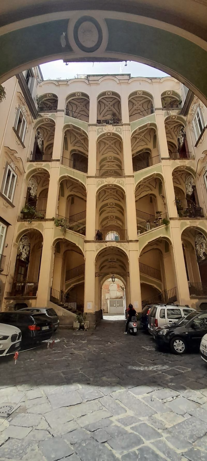 Baroque staircase courtyard of Palazzo dello Spagnolo, Rione Sanità, Naples