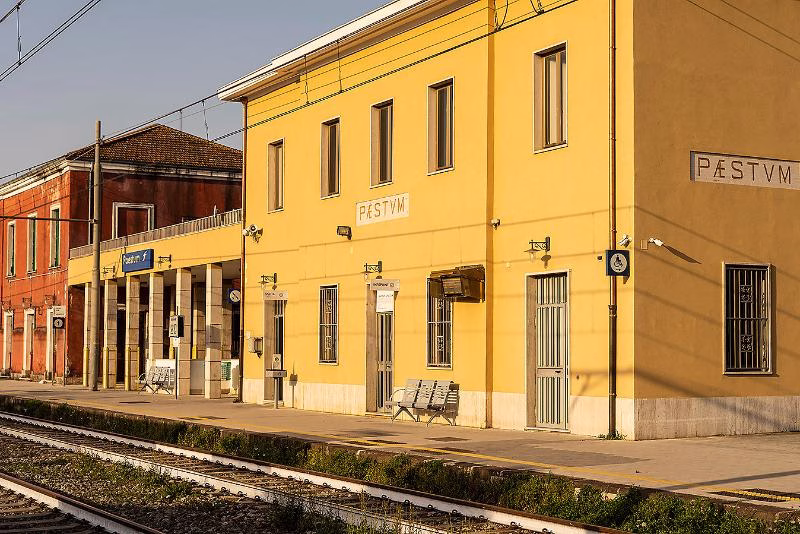 Paestum railway station in southern Italy with station building and tracks