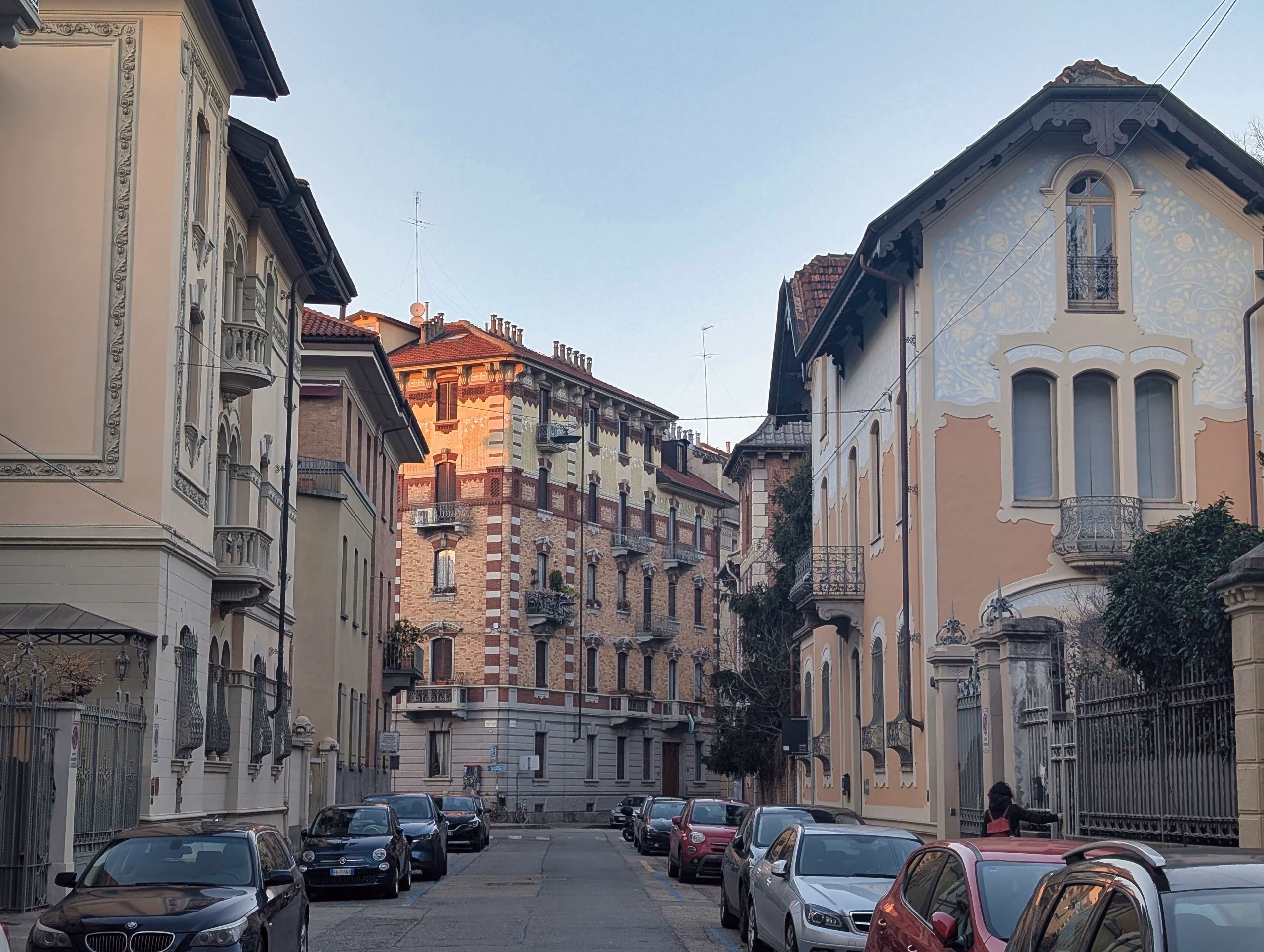 Via Beaumont, Turin — Casa Galleani d’Agliano (Palazzina Ostorero) on the right Via Beaumont in Turin with Casa Galleani d’Agliano (Palazzina Ostorero) on the right, showing a Liberty-style façade with painted decoration and wrought-iron balconies