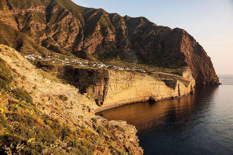 Coastal cliffs and volcanic landscape on Salina, Aeolian Islands, Italy