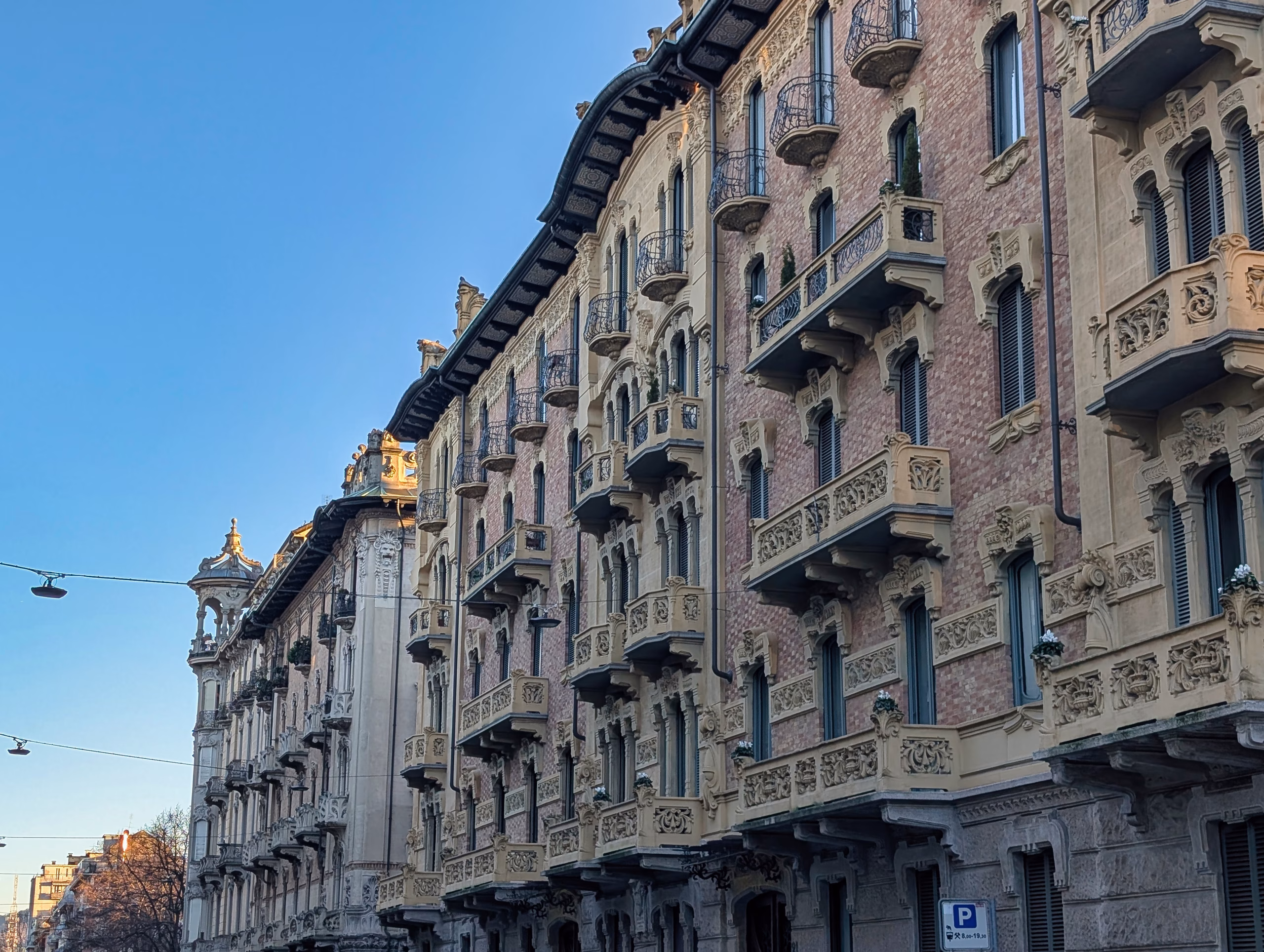 Liberty residential frontage, Via Principi d’Acaja, Turin Early 20th-century Liberty apartment buildings along Via Principi d’Acaja in Turin, with repeated balconies, sculpted stone frames and brick façades