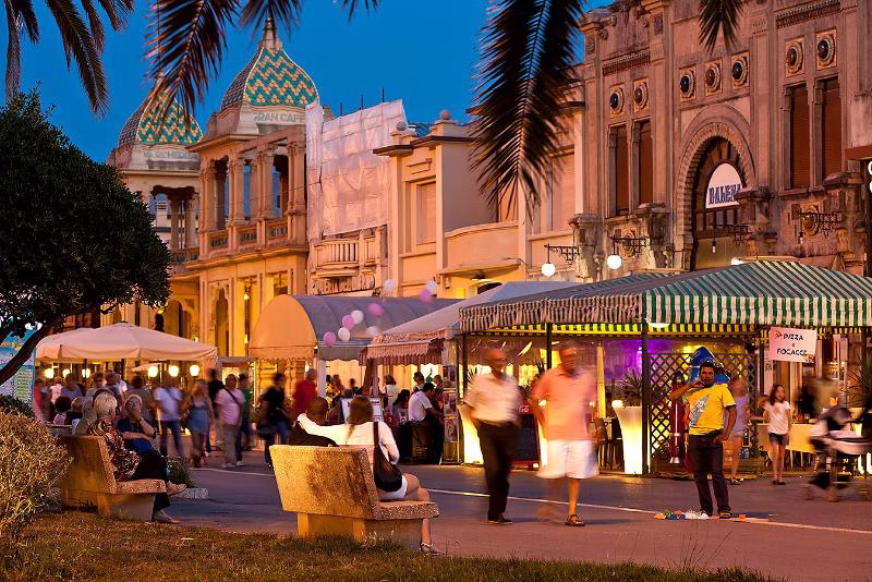 Evening promenade and cafés along the Versilia coast, Tuscany, Italy