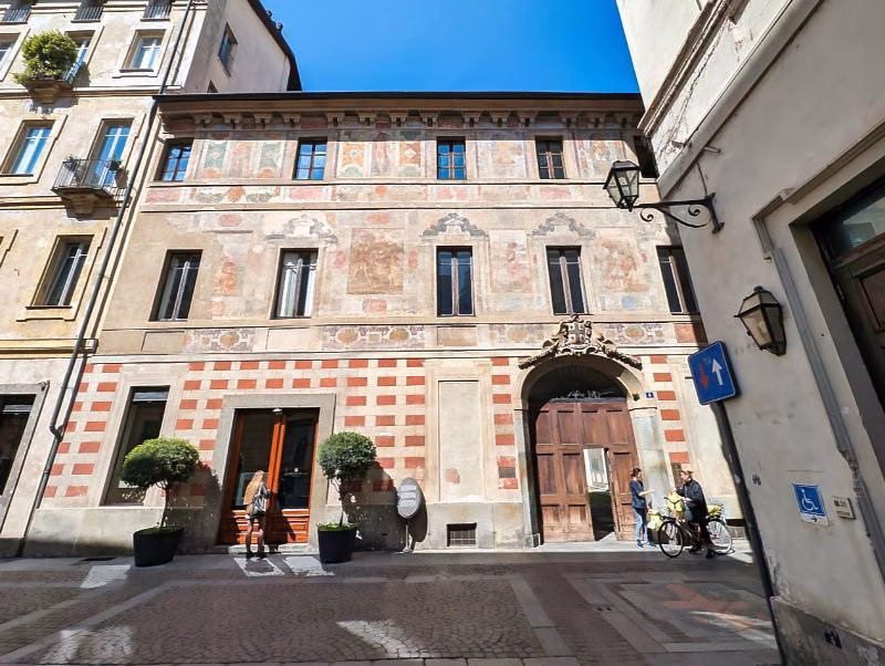 Historic building with painted façade in the Quadrilatero Romano, Turin.