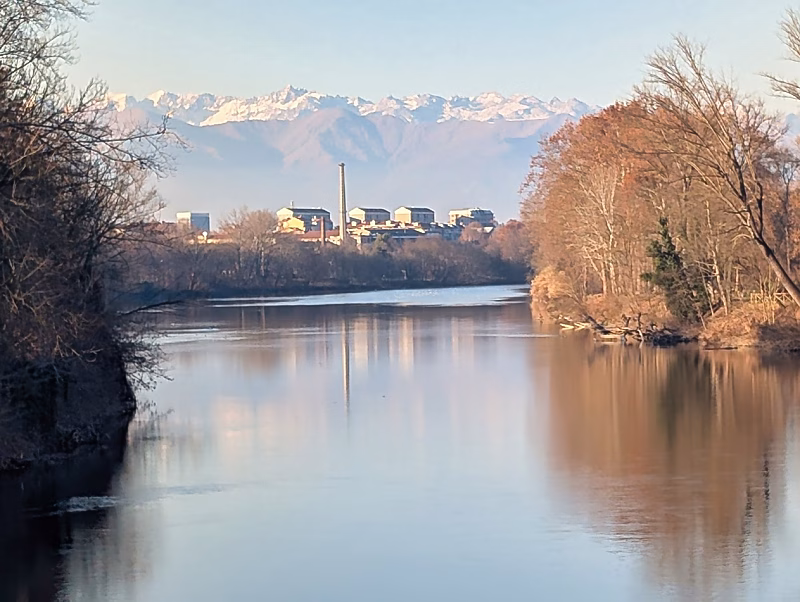 The River Po in Turin with the Alps in the distance, seen from the Vanchiglia area