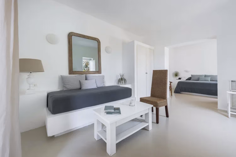 Junior Suite with sitting space at Capofaro Resort
