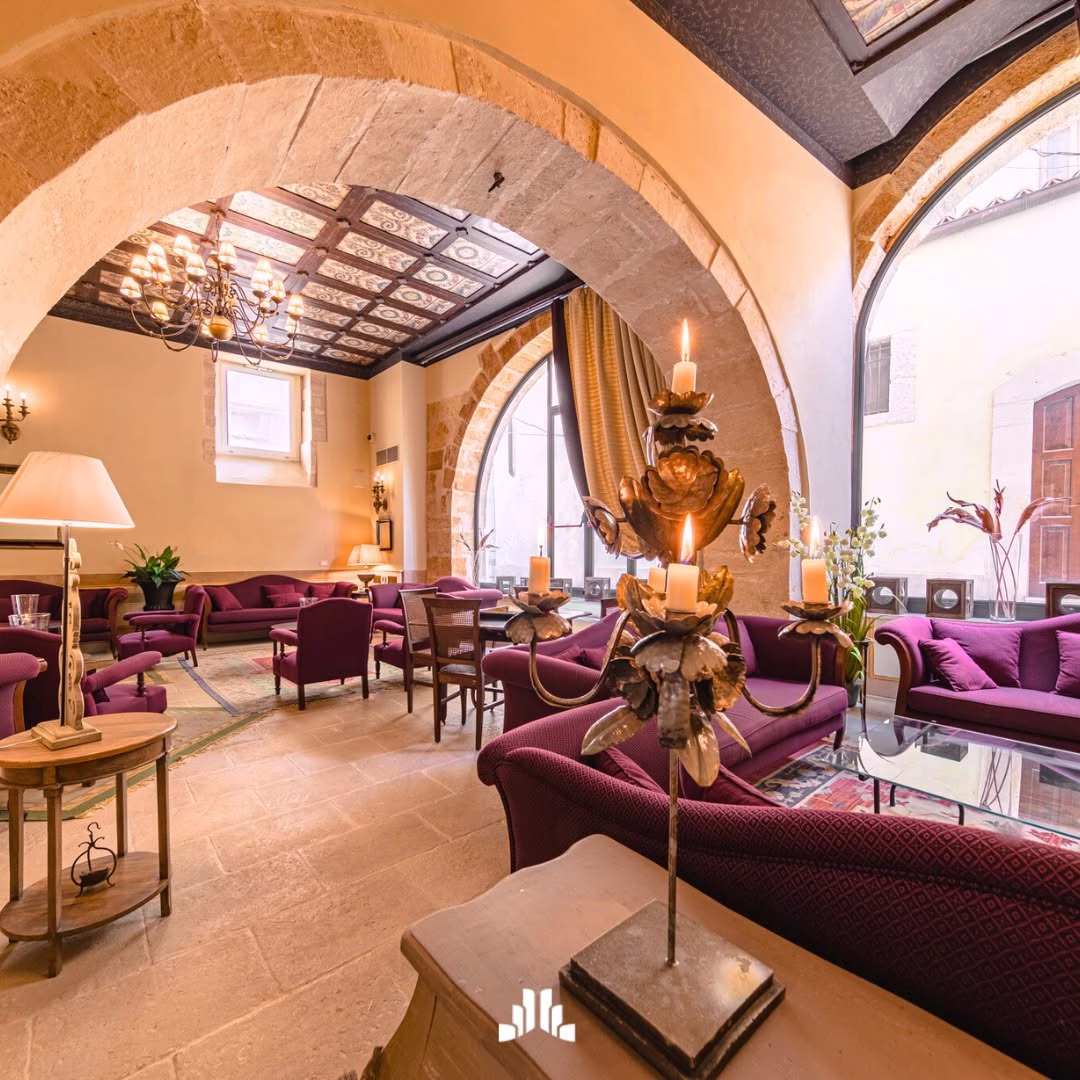 Historic hallway and interiors at Algilà Ortigia Charme Hotel