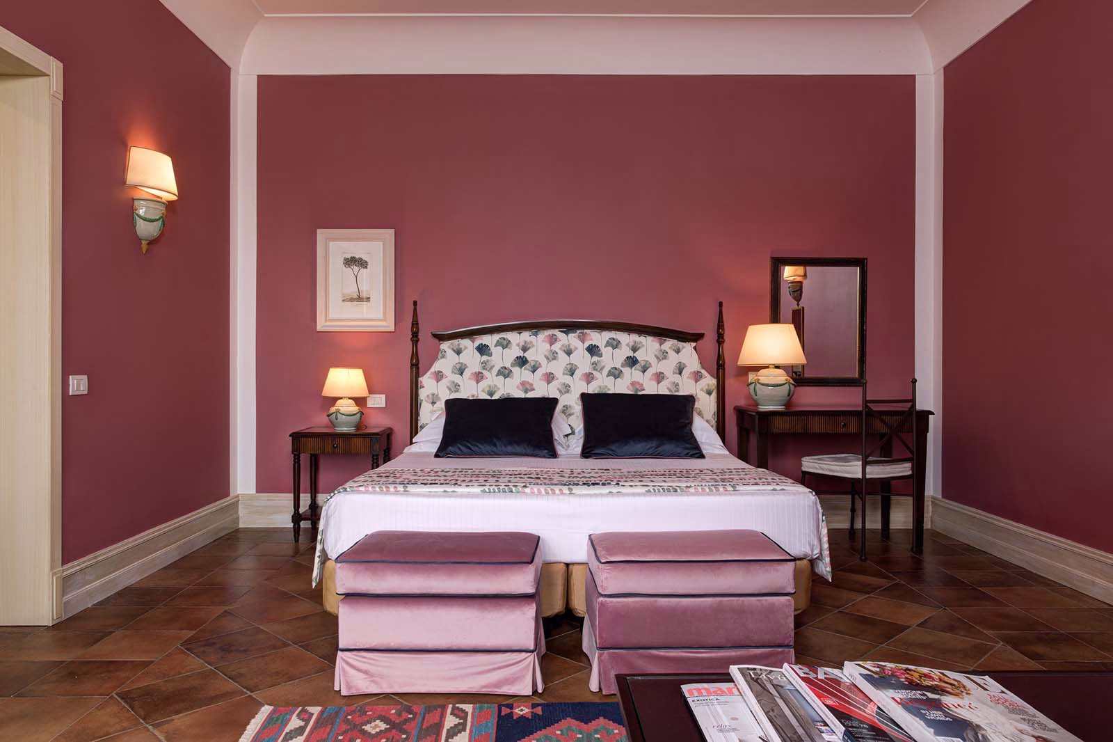 Junior suite at Baglio Oneto with sitting space and Sicilian interiors