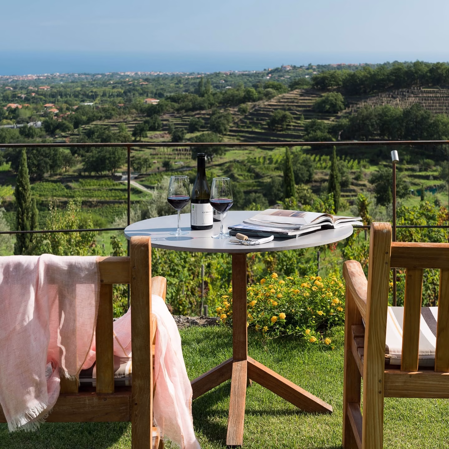 A quiet moment with wine and views at Monaci delle Terre Nere