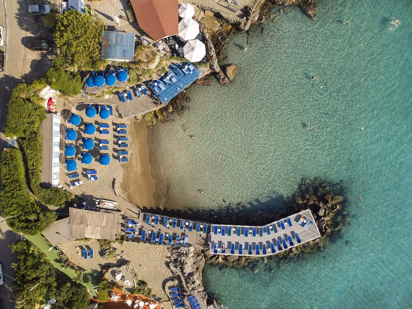 Private beach and clear sea below Excelsior Belvedere Hotel in Ischia