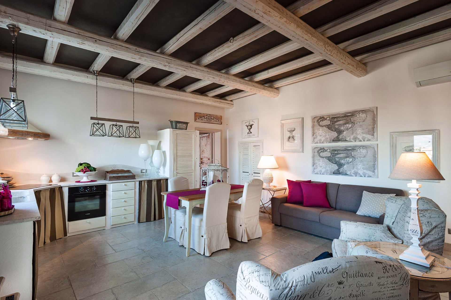 Open-plan kitchen and living area at Villa Pina