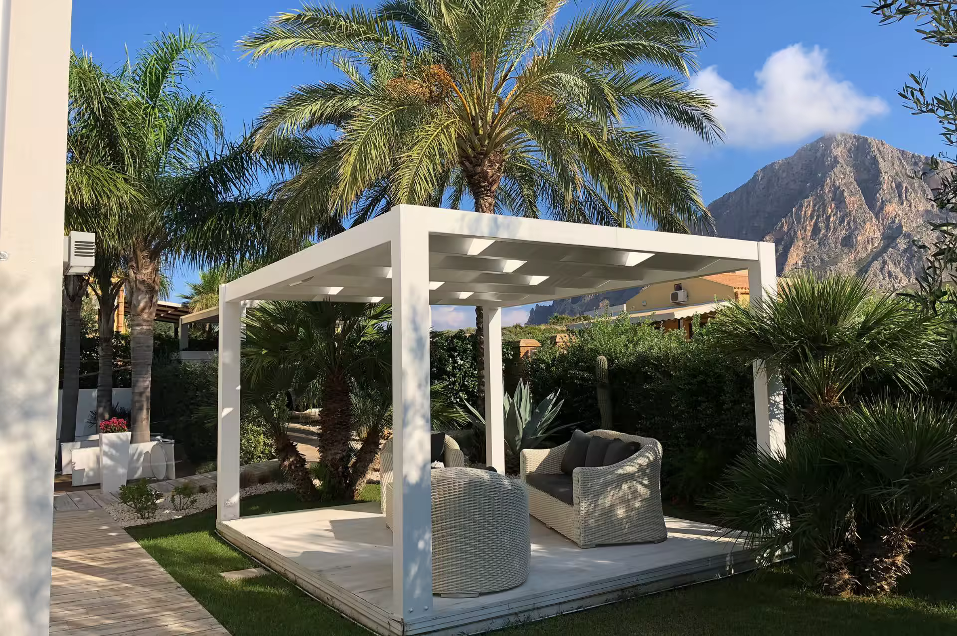 Garden gazebo and Mount Cofano at Villa Spuma