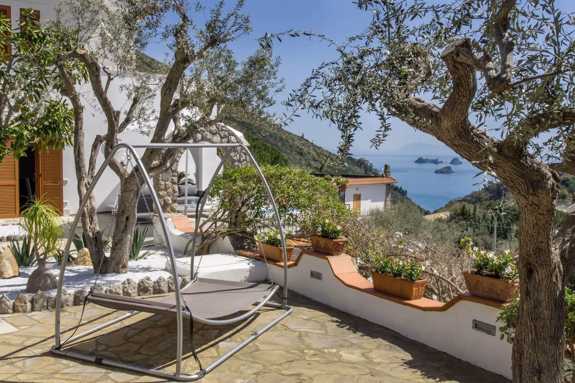 Mediterranean garden and swing at Villa Mira