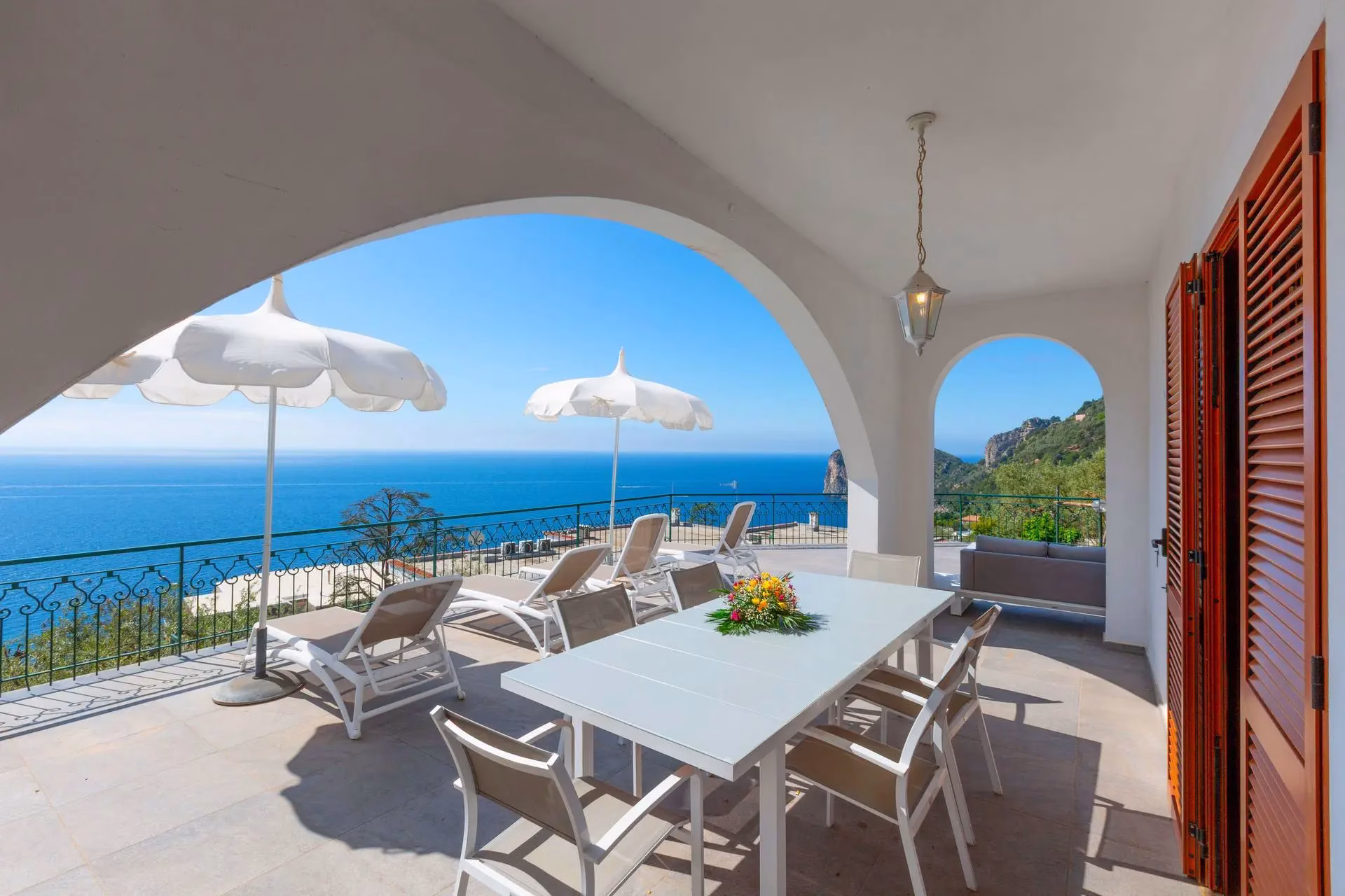 Sea-view dining terrace at Villa Mira