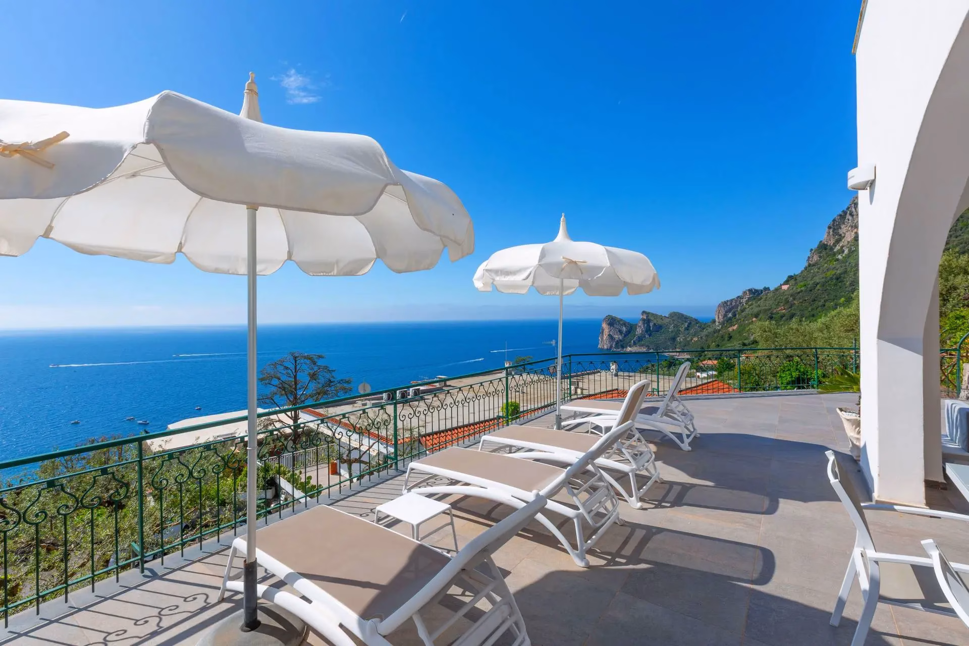 Sun terrace overlooking the sea at Villa Mira