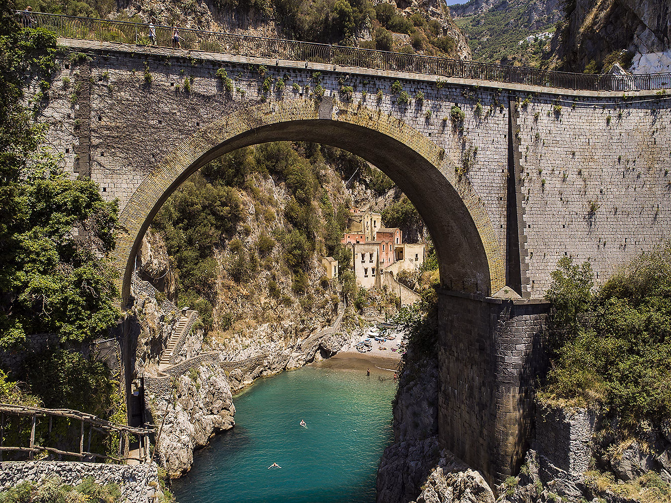 Furore’s arched bridge above the inlet and small waterfront buildings