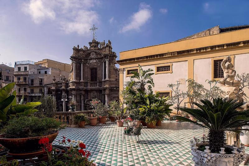 Planted tiled terrace at Palazzo Gangi facing the church of Sant’Anna