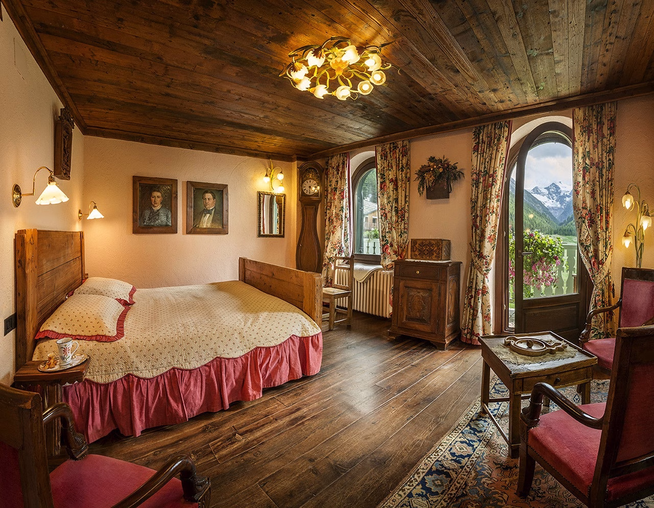Traditional bedroom with mountain outlook at Bellevue Hotel and Spa in Cogne