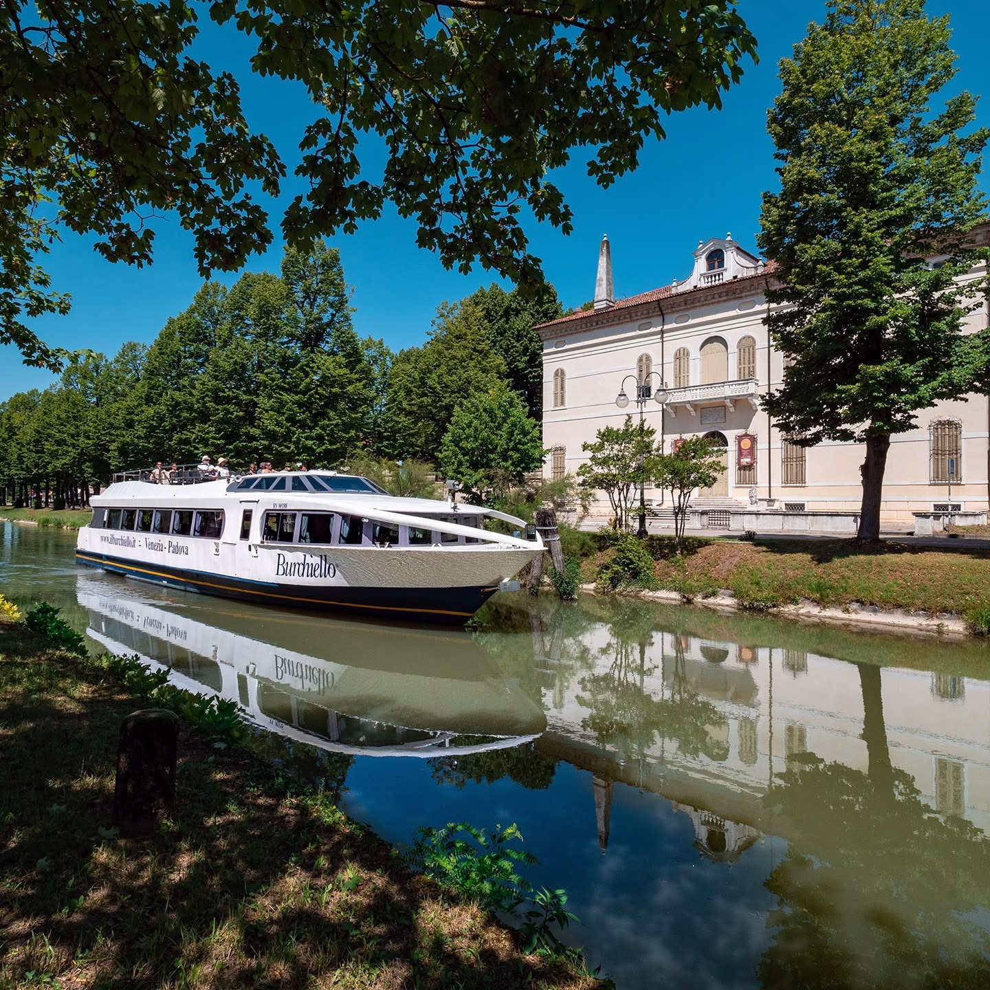 Il Burchiello passenger boat beside a villa on the Brenta Riviera