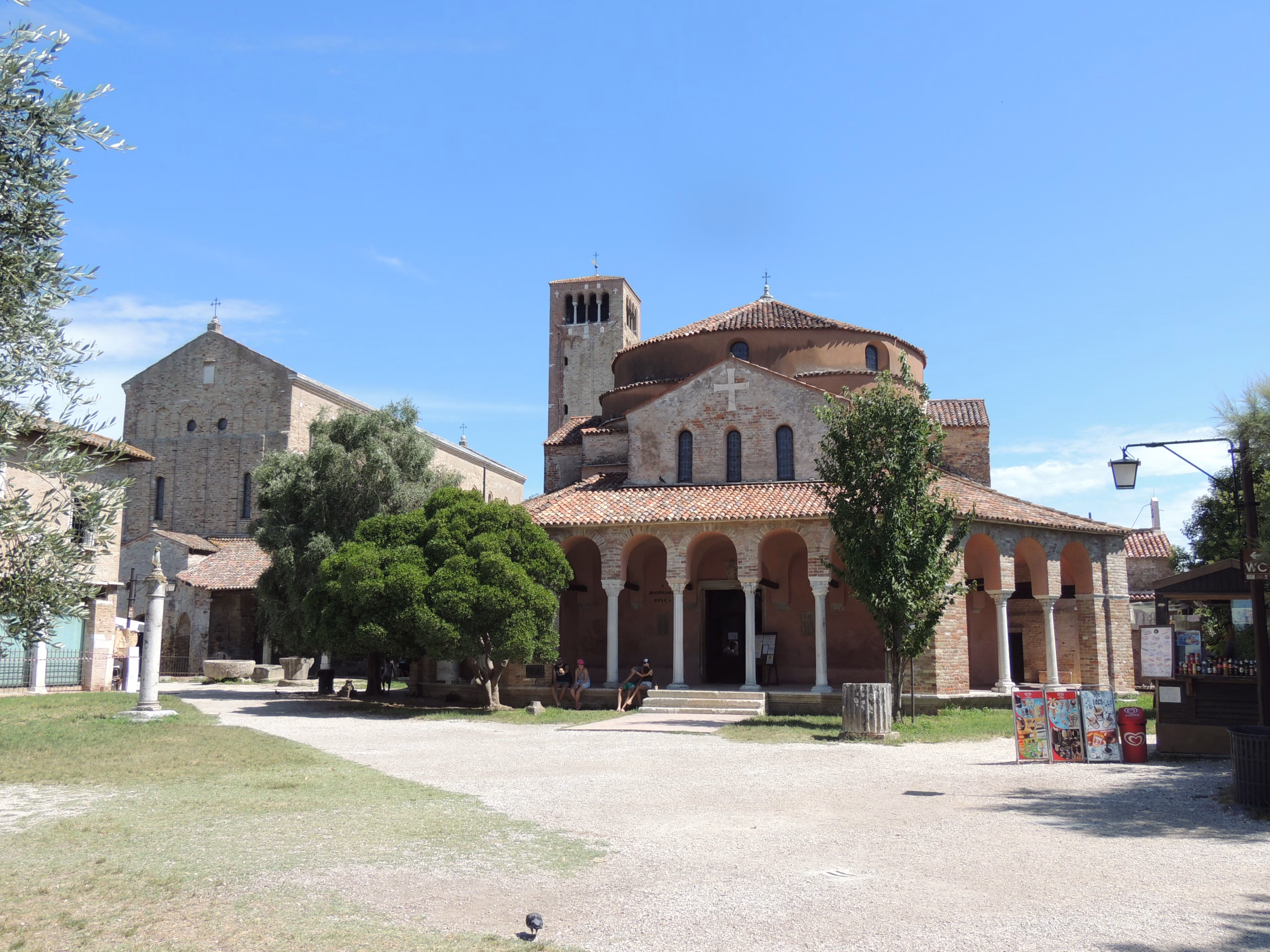 Santa Fosca in the foreground with Santa Maria Assunta and its bell tower on Torcello