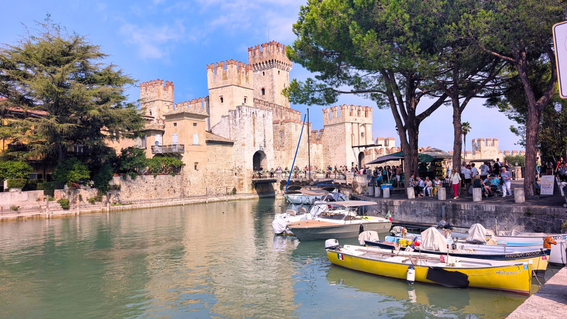 Scaligero Castle and boats in the harbour at Sirmione