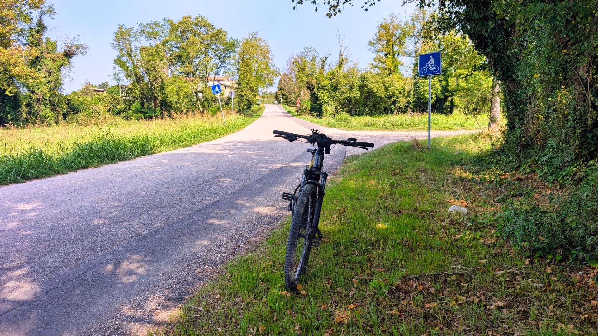 E-bike beside a countryside path near southern Lake Garda