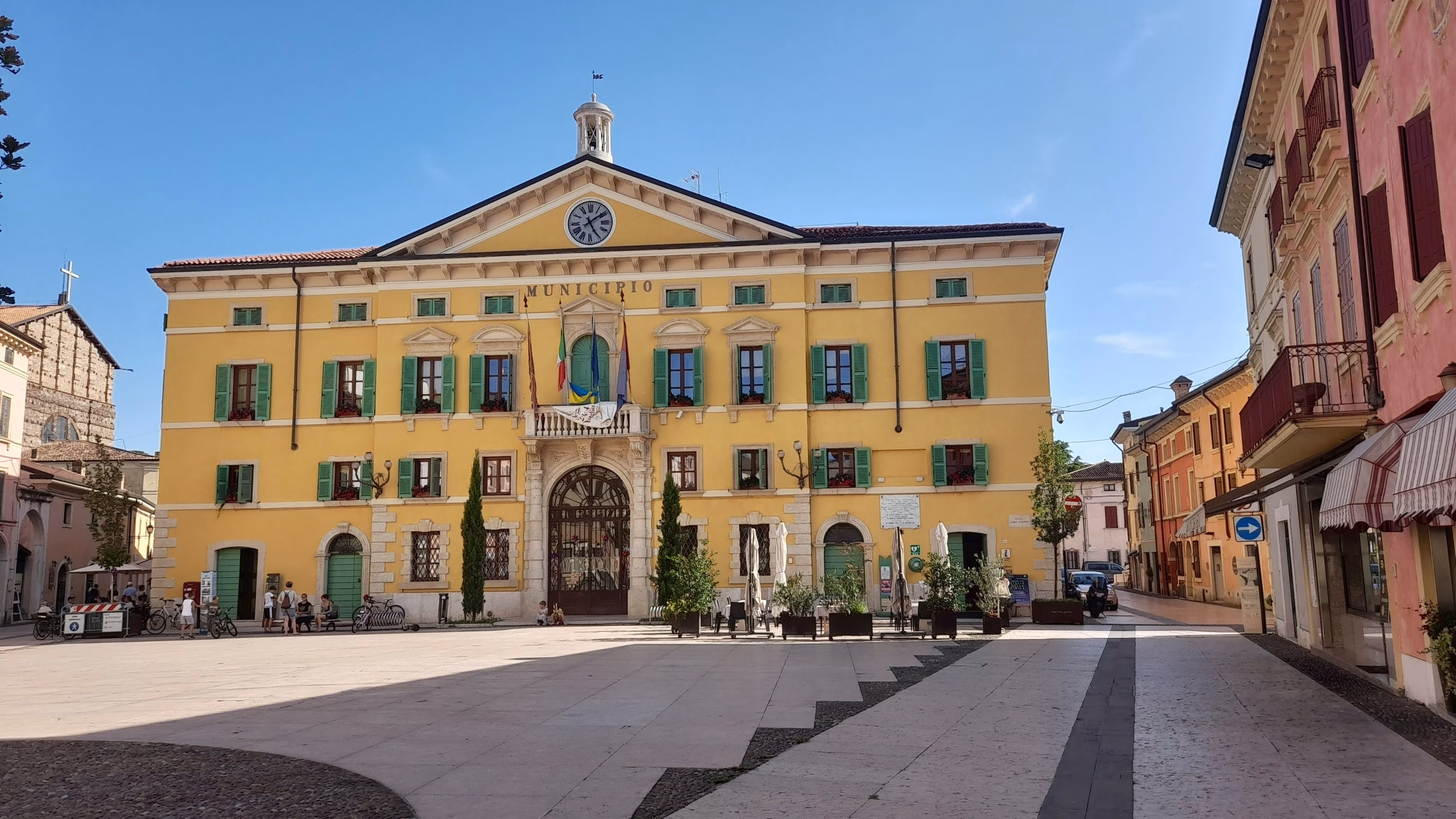 Yellow town hall overlooking the square in Valeggio sul Mincio