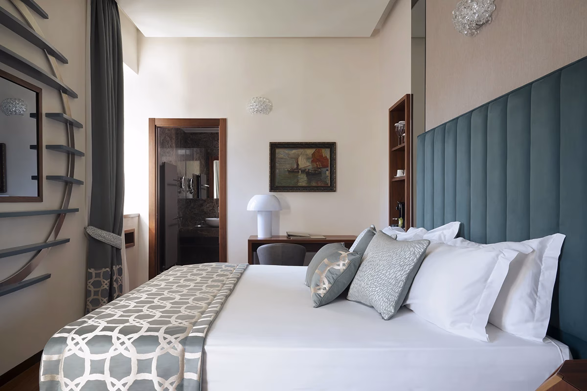 Oliveto Deluxe Room bedroom