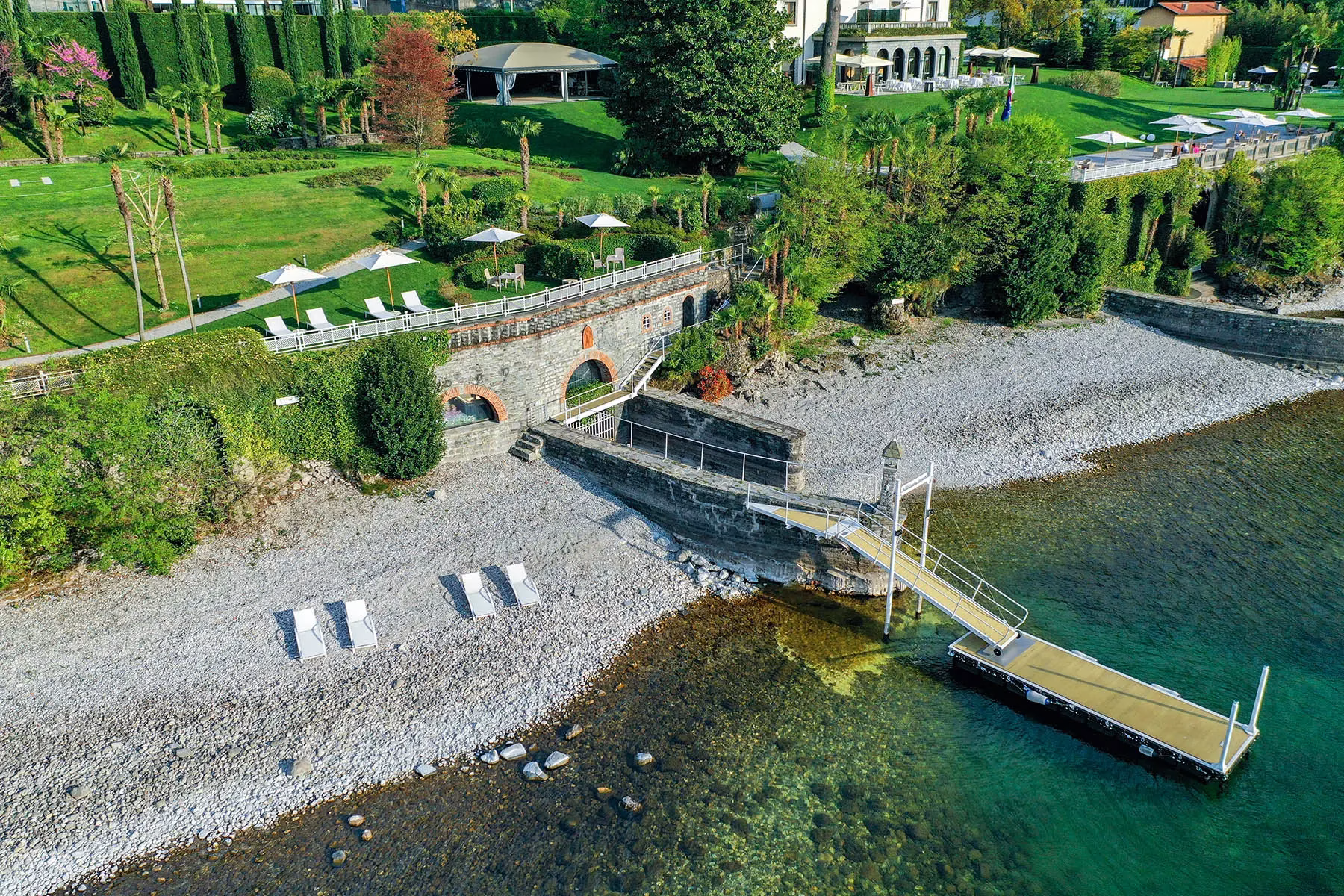 Historic boathouse suites and beach beside Lake Como